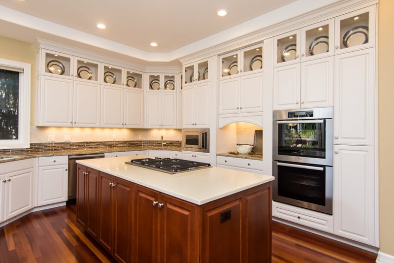 kitchen remodel with white cabinets and island in salem oregon by Kraft Custom Construction