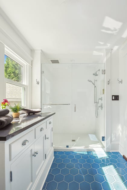 Bathroom Remodel: White Bathroom, Glass Shower, Blue Tile Floors