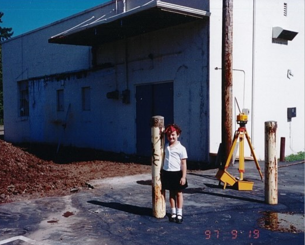 Young Emma Kraft Standing In Front of A Construction Site